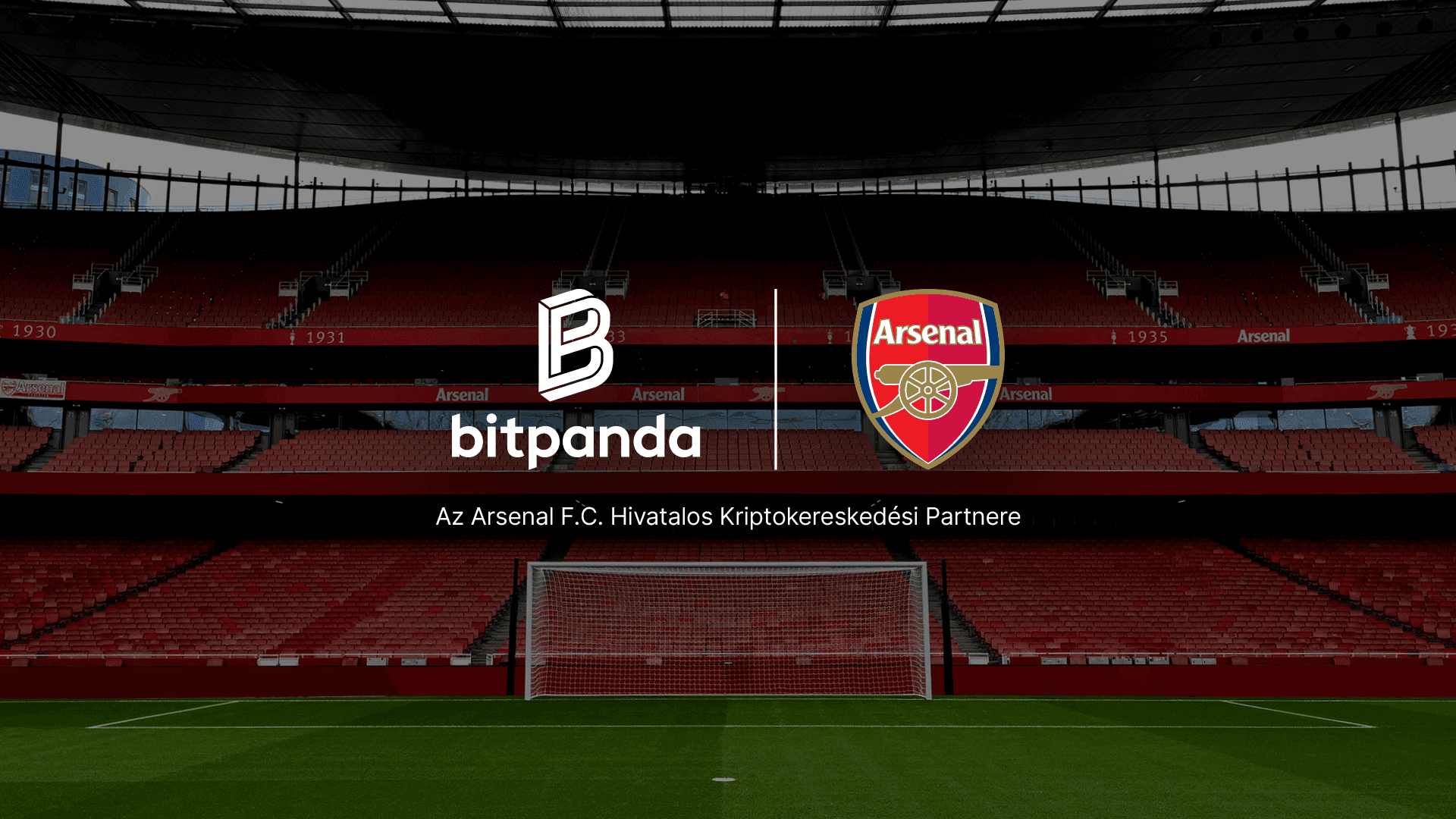 Empty stadium with Bitpanda and Arsenal logos displayed, highlighting their partnership.