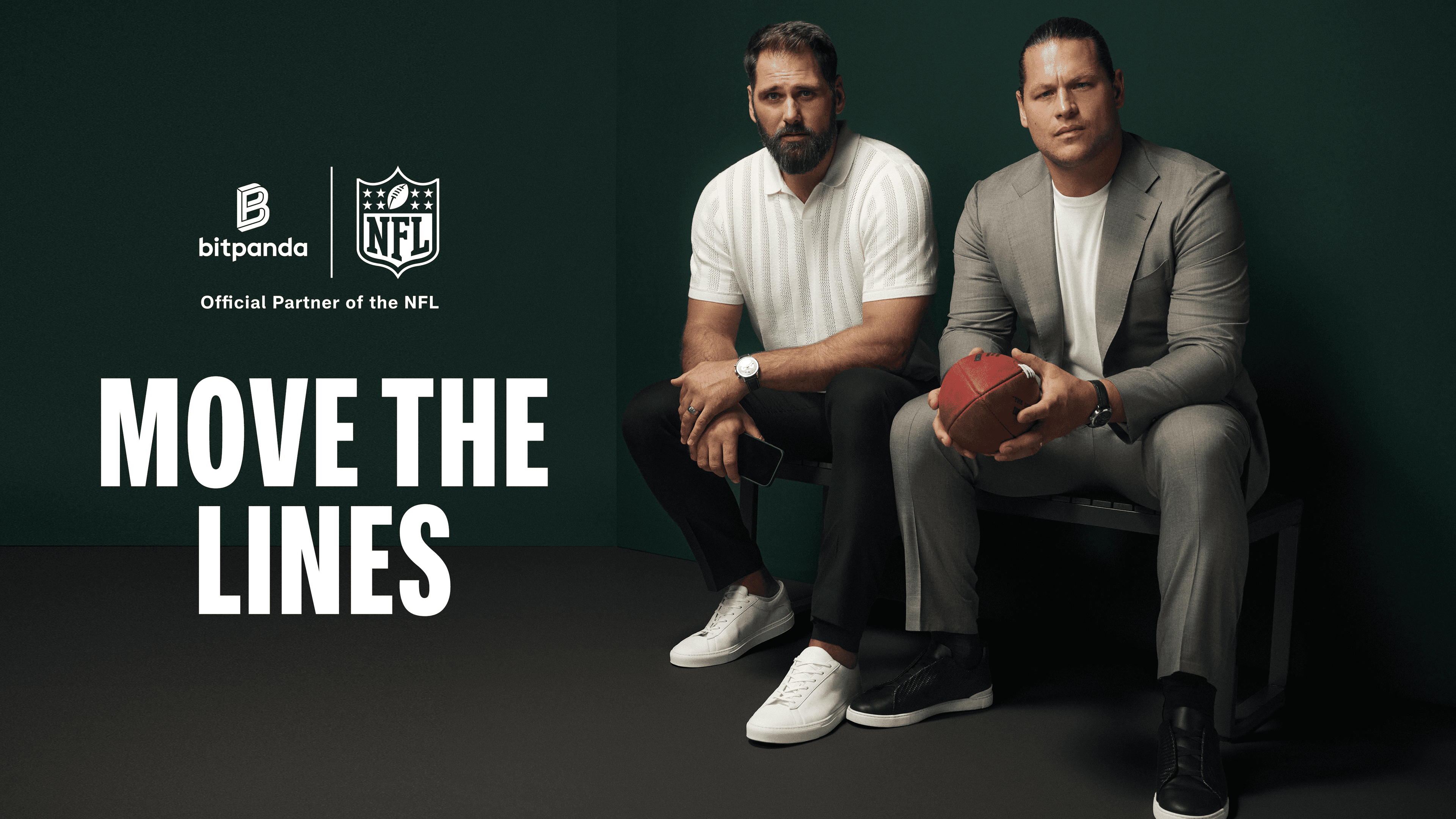 Two men sit on a bench; one in a white shirt, the other in a gray suit holding a football. Text reads "Move the Lines" with Bitpanda and NFL logos.