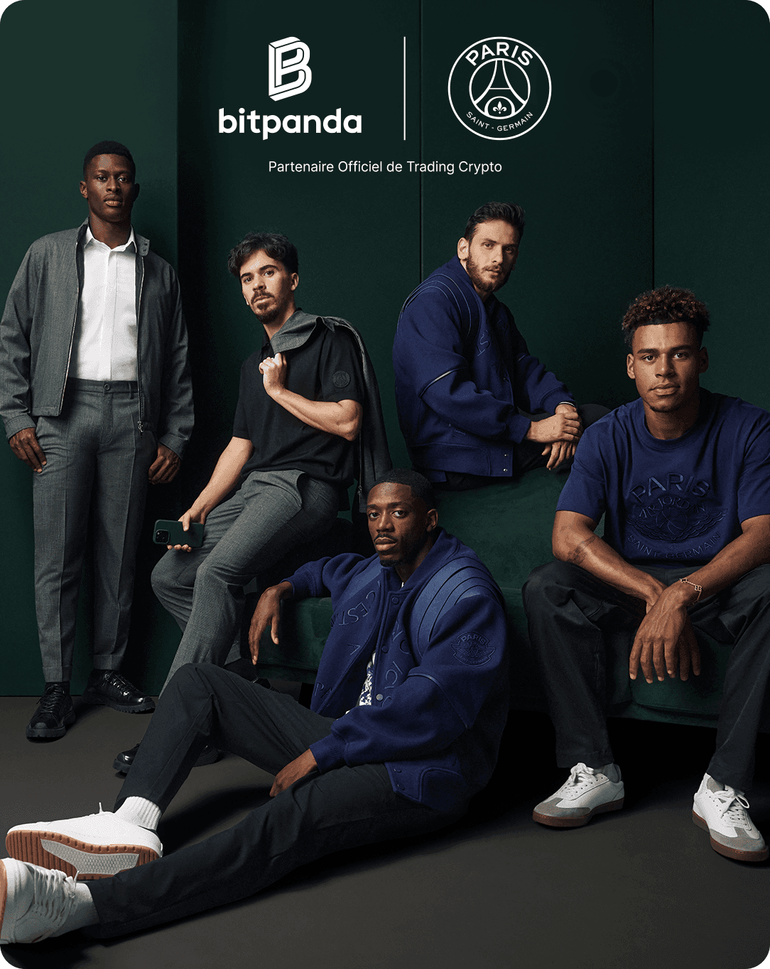 Five men pose in stylish outfits against a dark green backdrop, with Bitpanda and Paris Saint-Germain logos above them.