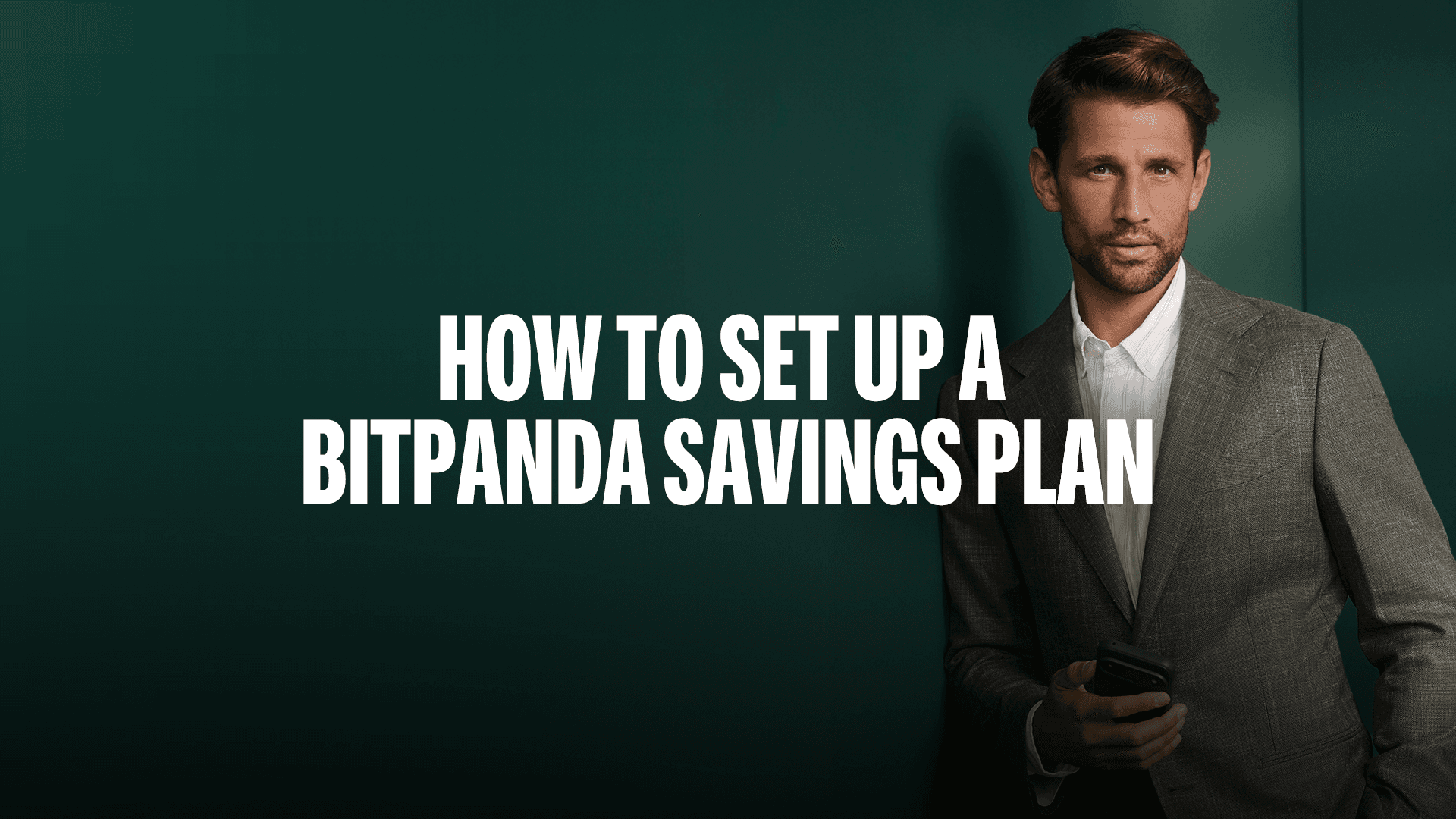Man in a suit holding a phone, standing next to text: "How to Set Up a Bitpanda Savings Plan" on a dark green background.