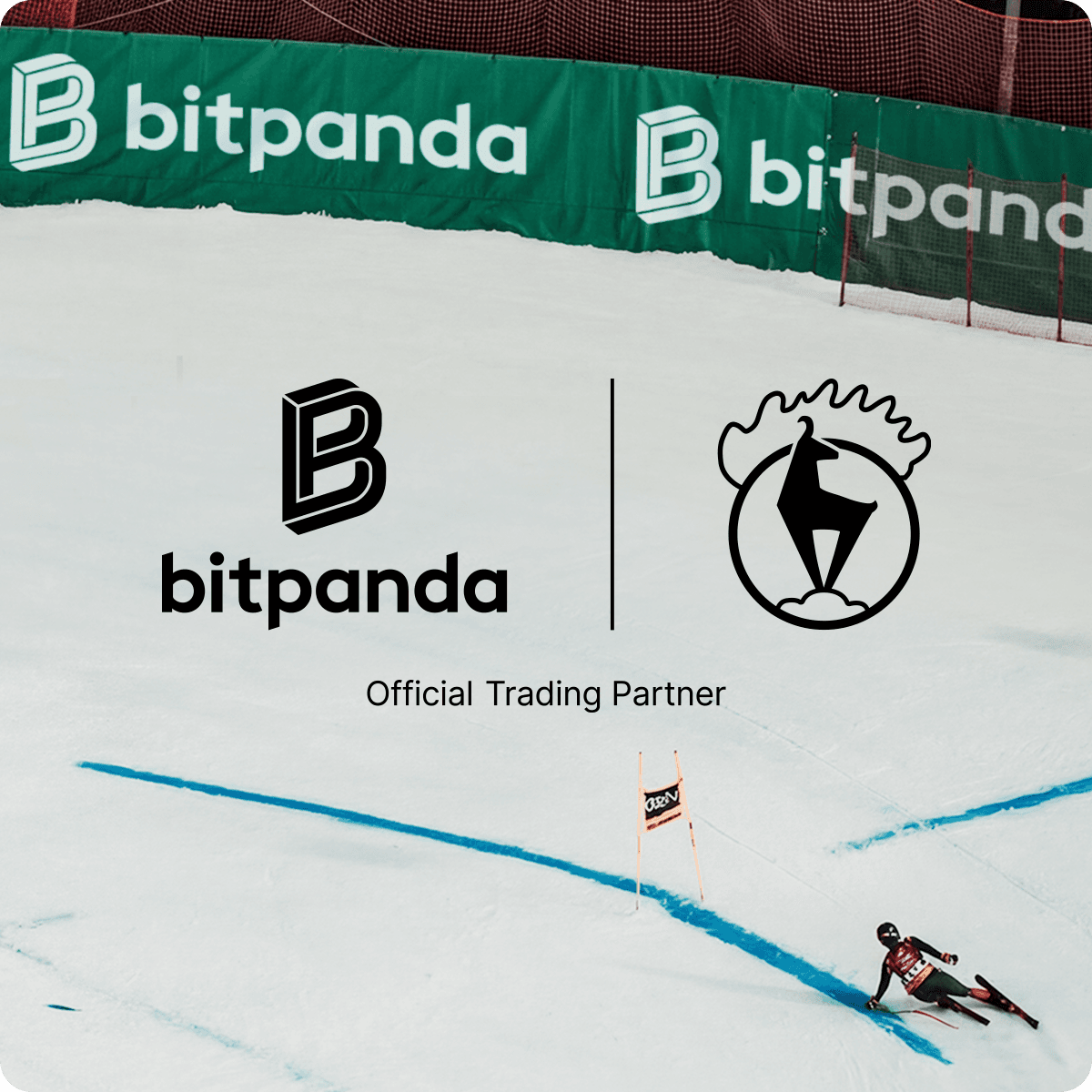 A skier navigates a snowy course beside Bitpanda branding, featuring logos and "Official Trading Partner" text in a wintry sports setting.
