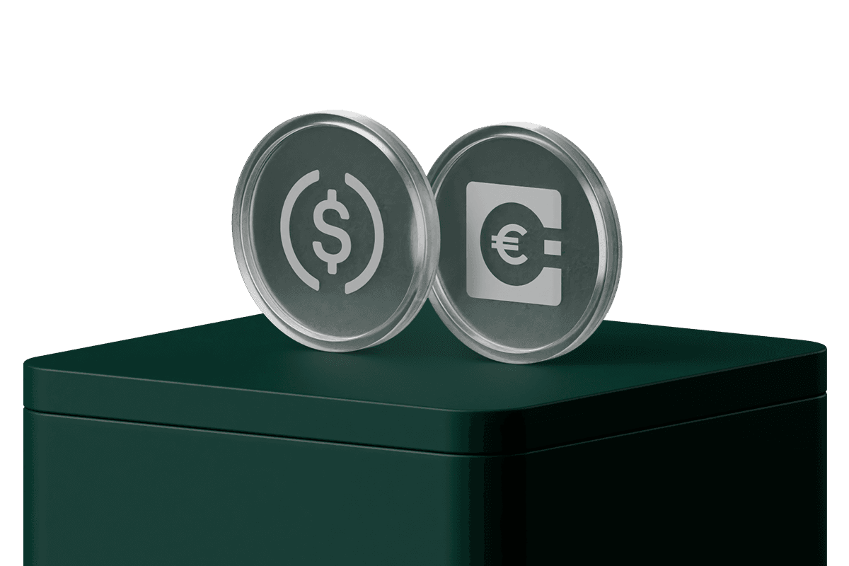 Two metallic coins with dollar and euro currency symbols standing upright on a dark green rectangular platform.