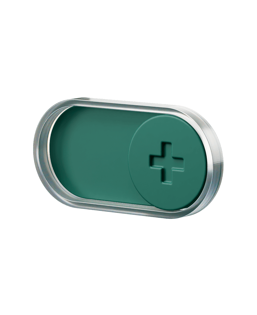 Green oval pill-shaped object with a metallic edge and embossed plus sign on one end, isolated on a white background.